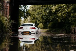 A Mercedes stuck in flooding near Albrighton after torrential rain on Sunday
