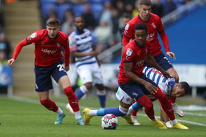 Grady Diangana of West Bromwich Albion and Tom Ince of Reading during the Sky Bet Championship between Reading and West Bromwich Albion at Select Car Leasing Stadium on October 15, 2022 in Reading, United Kingdom. (Photo by Adam Fradgley/West Bromwich Albion FC via Getty Images).