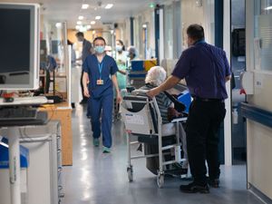 A general view of staff on a NHS hospital ward at Ealing Hospital in London