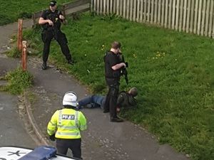 Supporting image for story: Two men arrested after armed police swarm Shrewsbury street - with video