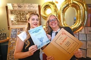 Duty manager Charlotte Gibson and pub manager Sian Siddall show off some of the items donated for the event