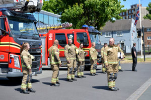 Firefighters at Walsall Fire Station turned out in full kit to honour a 100-year-old former firefighter and war hero George Stokes.