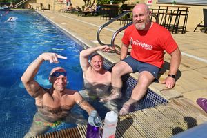 Plenty of people have gotten involved in the charity swim, pictured is: Neil Parsons, Jonny Pearson and Organiser and Watch Commander in Wednesbury, Jim McParland.