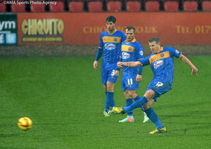 Paul Parry of Shrewsbury Town scores a goal to make it 1-1