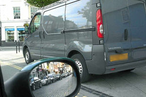 This van appears to be parked on double yellow lines