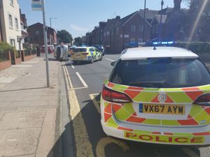 Supporting image for story: Car left on side in road crash