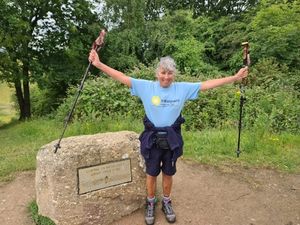 Supporting image for story: Devoted mother jumps for joy after completing marathon walk in memory of daughter