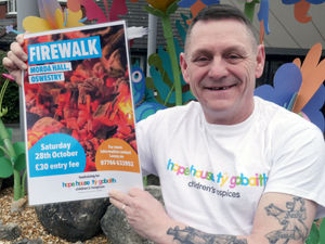 Supporting image for story: Fundraiser organises firewalk to help local charity