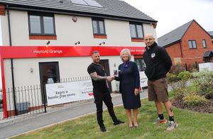Dean Pettinger and Alan Kennedy from Primal Instincts at Taylor Wimpey's Hayford Grange development following a donation for Mental Health Awareness Week