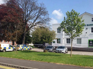 Supporting image for story: Boy, 15, arrested after daylight bank robbery