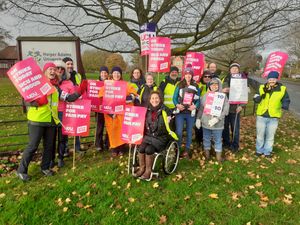 Picketing university staff gather at the Harper Adams campus near Newport