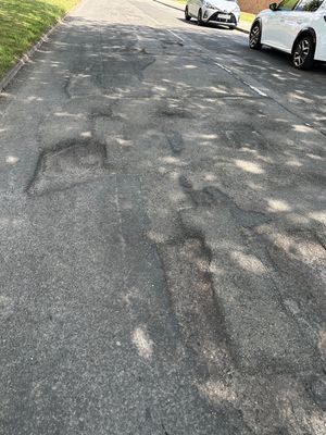 Potholes in Chad Road, Coseley