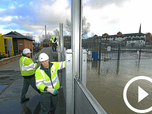 Supporting image for story: Video: At last - the flood barriers come down in Shrewsbury