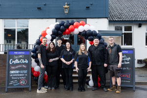 Staff and community hero, Owen, outside of The Castle Inn