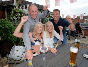 Paul and Julie Mills, and Helen and Ashley Ibbs-George have a drink before settling down to the game