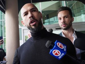 Supporting image for story: Lawyer says Tate brothers will return to UK to face rape and trafficking charges