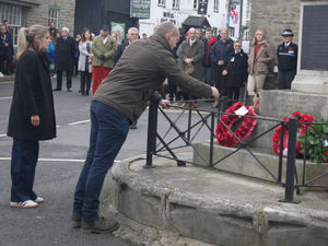 Simon Turner laying a wreath on behalf of his cousin the late Lance Corporal Oliver Thomas, 26, who was tragically killed in a helicopter crash in Afghanistan in 2014. Pic by Karen Compton