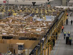 Supporting image for story: Amazon patents wristband that can track warehouse workers’ hands in real time