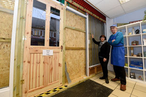 Manager Mandy Lehmann and volunteer Bill Ramsbottom view the damage