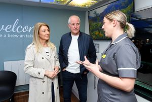 Wolves legend Steve Bull and wife Kirsty have been announced as official Ambassadors for Compton Care. They are pictured chatting to nurse Katie Jones.