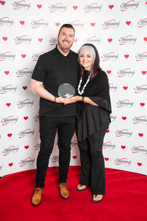 Receiving award as a Team of the Year nominee