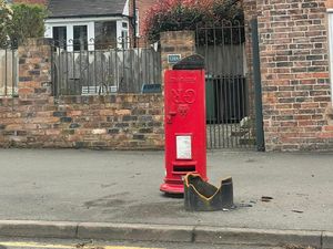Supporting image for story: Post box ripped out the ground and turned upside down - leaving residents baffled
