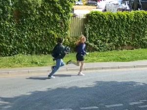 A screen grab taken from CCTV issued by the Metropolitan Police of two teenagers they want to speak to after two kittens were tortured and killed in Ruislip, London