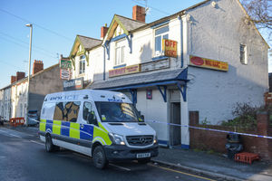 Police outside the shop with the flat above
