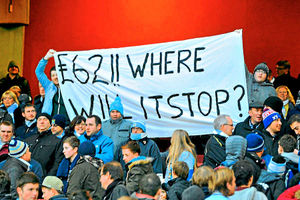Angry City fans protest over the price of the £62 tickets at Arsenal