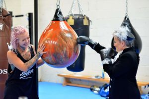 High Sheriff Dean Harris put on the gloves herself, with Hayley Broxton talking her through the training.