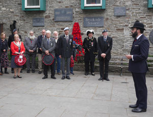 Dignitaries and veterans listening to Thomas Heakin saying the Exhortation. Image: Karen Compton