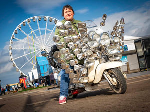 Supporting image for story: The Birmingham local who went from sleeping under his scooter to breaking records.