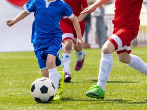Children playing football
