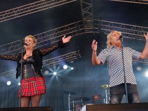 Cheryl Baker and Mike Nolan performing on stage