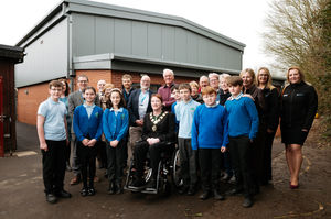 Children with Oswestry Mayor Becky Wall outside their new facilities on Tuesday