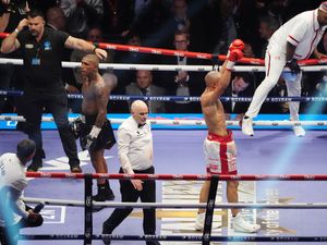 Chris Eubank Jr, centre right, celebrates winning the middleweight bout against Conor Benn