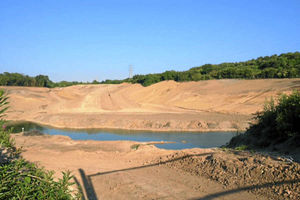After – the 'Blue Lagoon' has all but disappeared after the owners drained most of the water