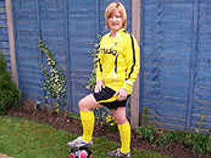 Supporting image for story: Val, 51, is getting a kick out of football