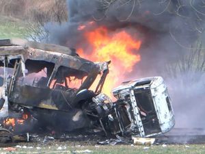 Burning vehicles after a tanker and a tram collided in Germany