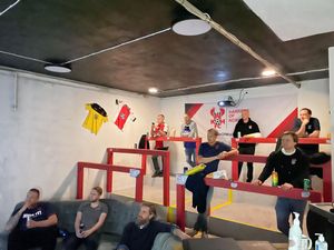 The group watch matches on terraces at their base in Aalesund