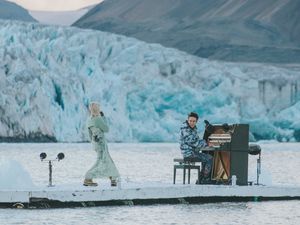 Supporting image for story: British singer performs duet amid Arctic icebergs in call for climate protection