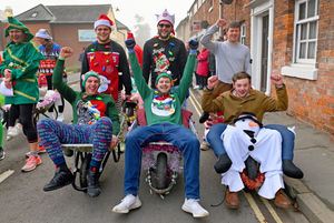 Wem's festive wheelbarrow race