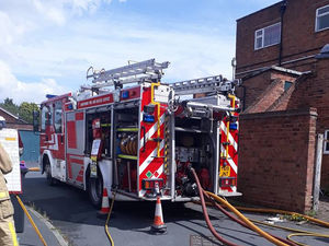 Supporting image for story: Firefighters battle Telford flat fire