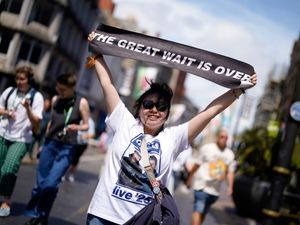 Supporting image for story: In Pictures: Oasis fans in Cardiff sunshiiine for first reunion tour gig