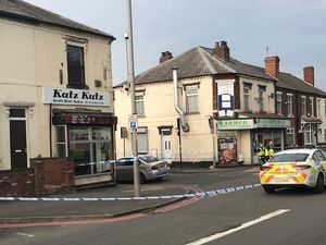 Supporting image for story: Walsall barber shop shooting suspect released amid investigation