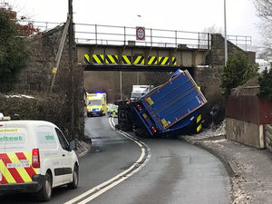 Supporting image for story: Road blocked and trains delayed after bridge crash lorry overturns