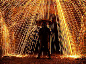Supporting image for story: Bright spark photographer's work is hot stuff