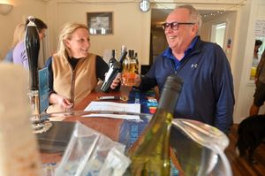 Willey Village Hall , near Broseley, and the annual Apple Press day where people can bring there apples to be turned into juice. At the bar: Vanessa Lee from Nordley and Clive Dickinson from Broseley.
