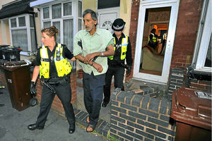 Mohammed Arif was arrested after his door was pushed in by police
