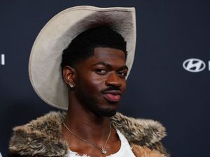 Supporting image for story: Lil Nas X held on suspicion of charging at LA police